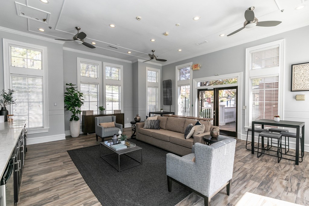 a living room with a couch and chairs and a table at Roswell Village, Roswell, Georgia