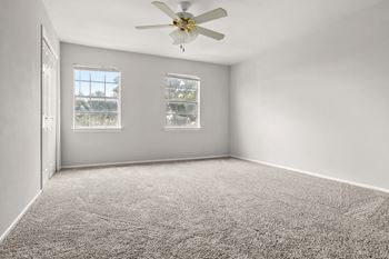 an empty room with a ceiling fan in it at Chevy Chase, Austin, 78752