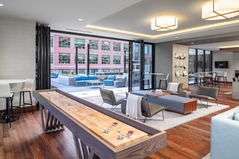 Clubhouse with a ping pong table and couches at 365 Nicollet, Minneapolis