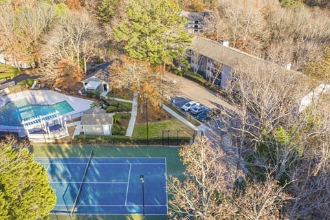an aerial view of a house and a tennis court and a pool at Atria at Crabtree Valley, Raleigh, NC