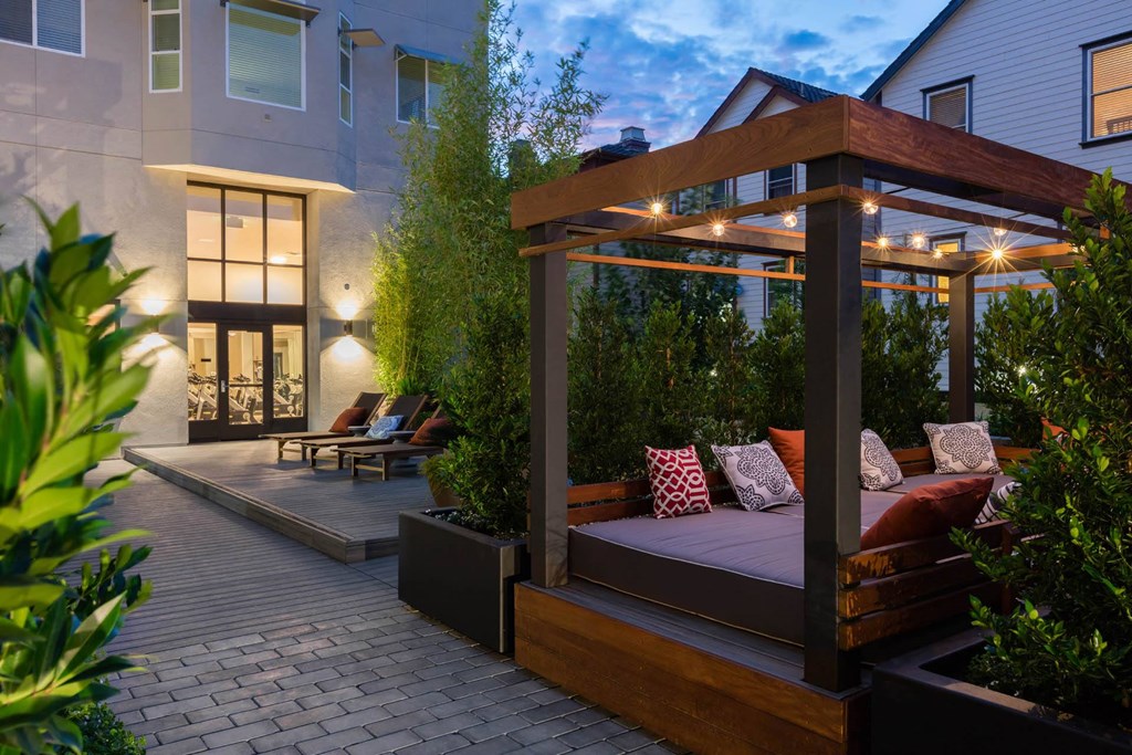Courtyard seating area at night at Aventine, Hercules, California