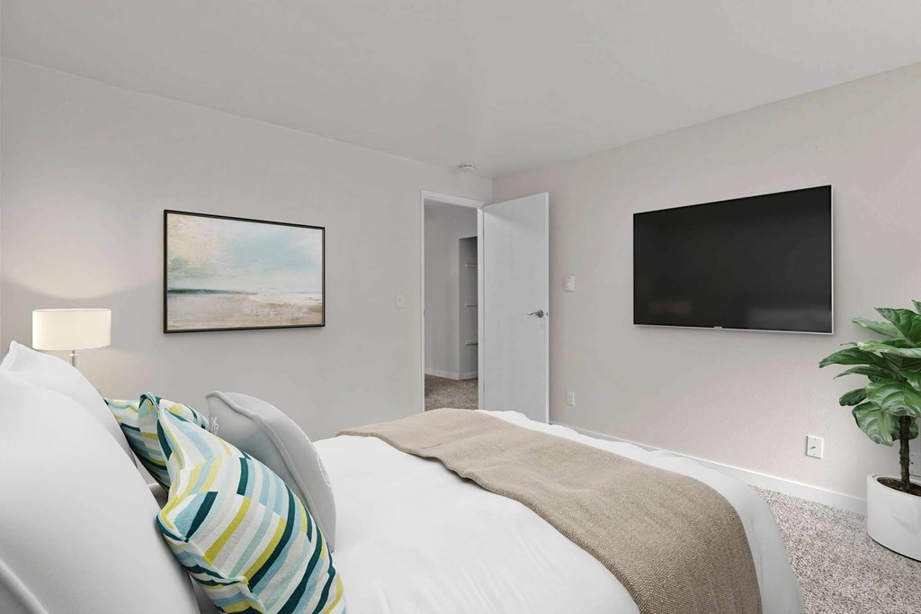 Bedroom With TV at Brackett Apartments, Washington, 98020