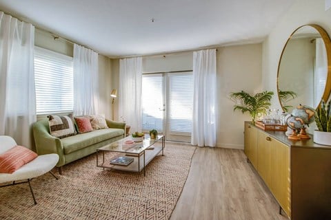 a living room with a couch and a table