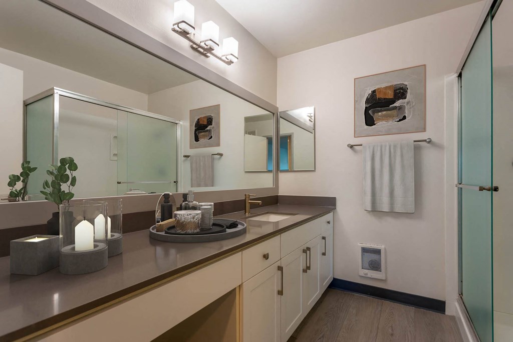 a bathroom with a sink and a mirror at Delphine on Diamond, California