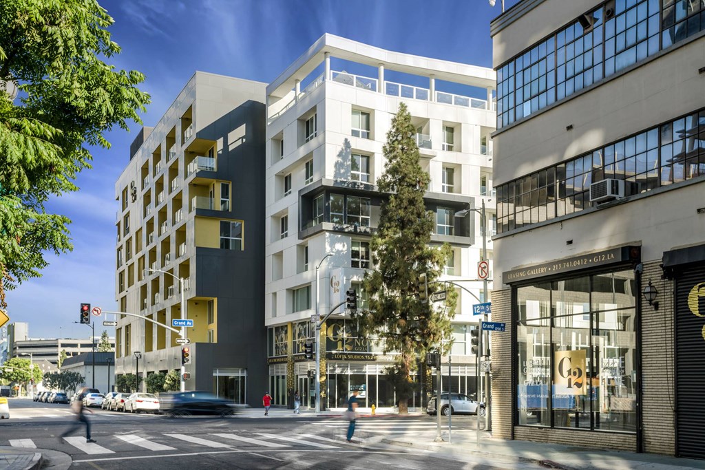 A city street with cars and buildings at G12 Apartments, Los Angeles, CA, 90015