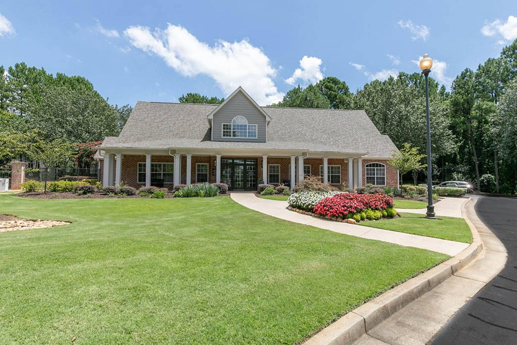 a large lawn in front of a house at Gwinnett Pointe, Norcross, Georgia