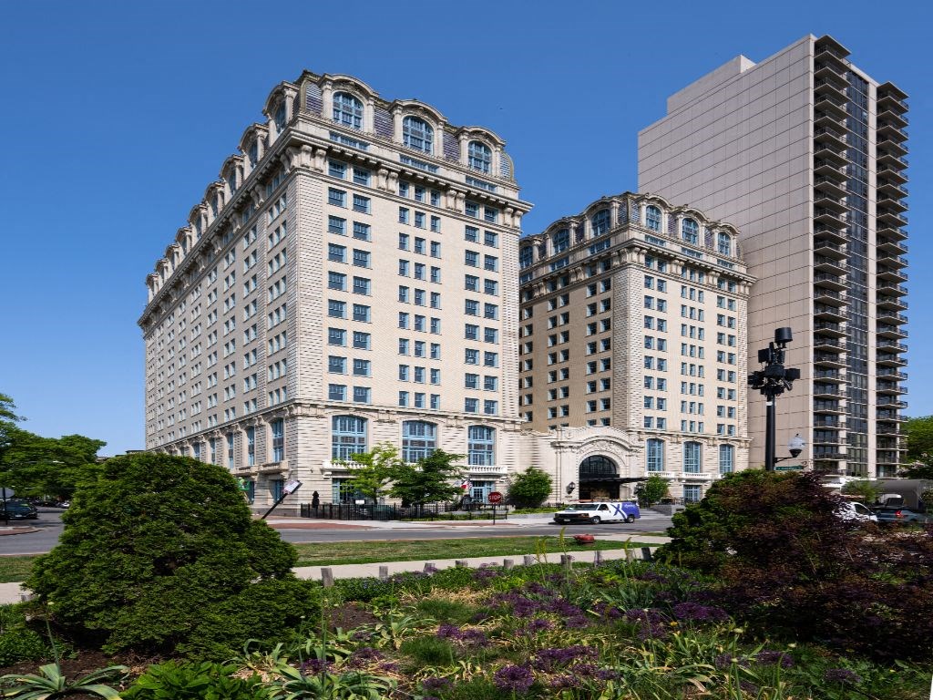 two tall buildings in the middle of a city street  at The Belden Stratford, Chicago, 60614