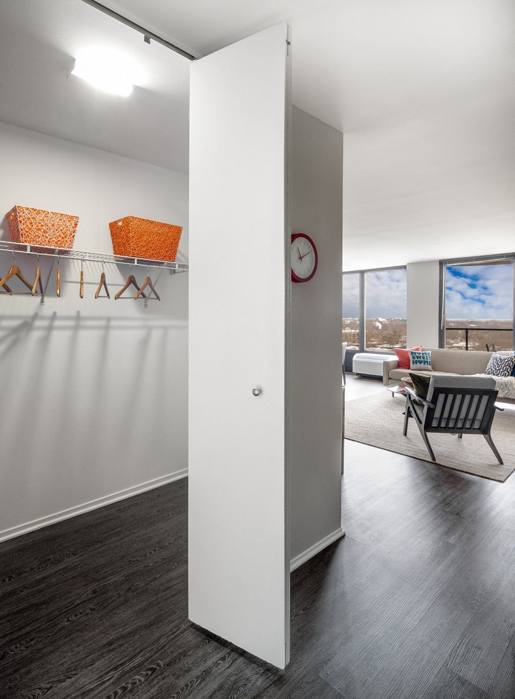 a view of a living room and dining room from a hallwayat The Montrose, Chicago, Illinois 60613