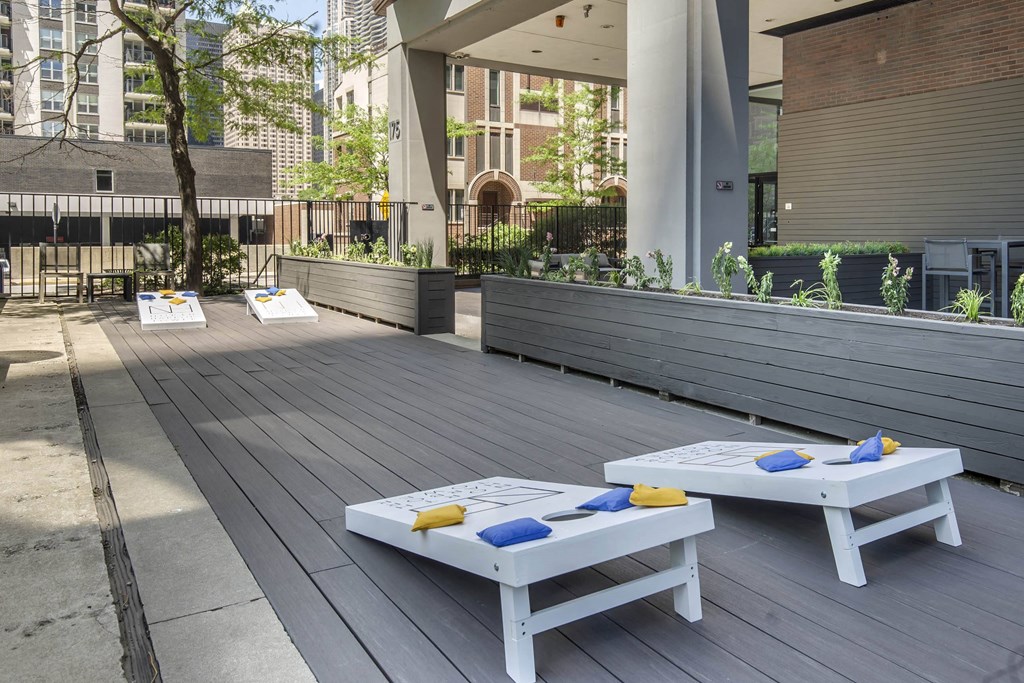 a communal area with benches and tables on a patio at North Harbor Tower, IL 60601