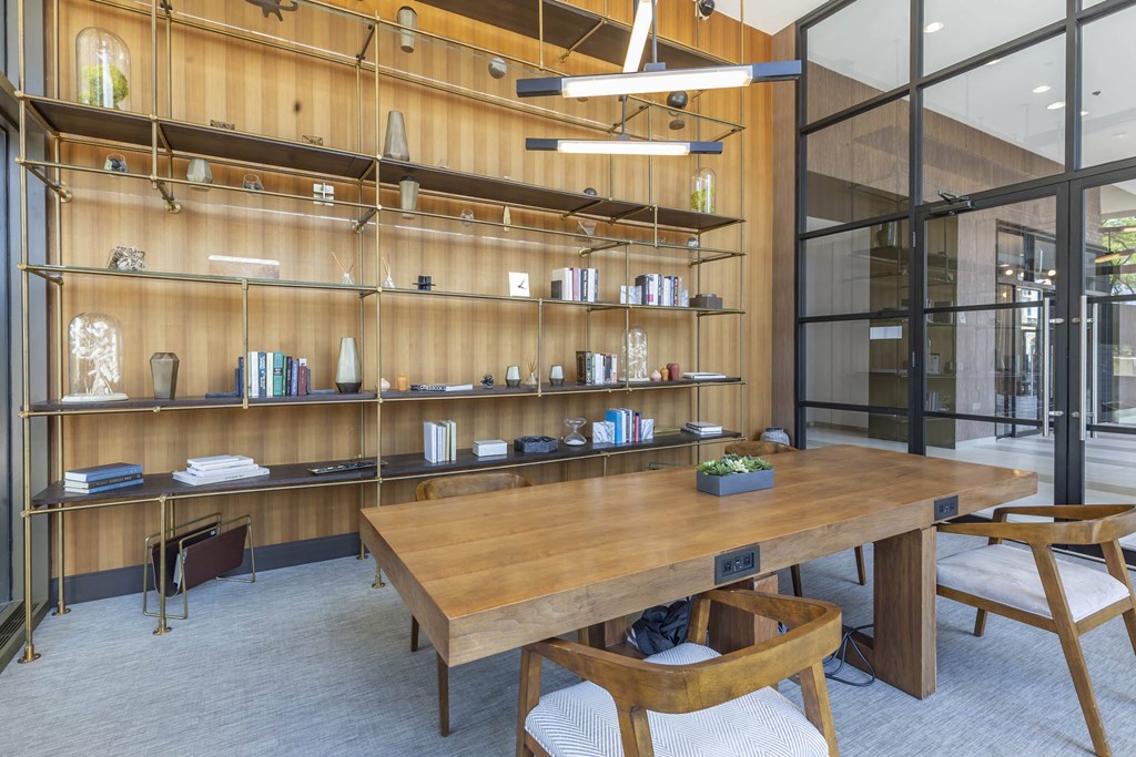 a conference room with a wooden table and shelves at North Harbor Tower, Chicago, IL