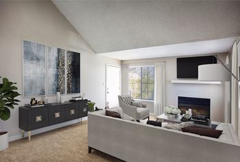 a living room with a white couch and a fireplace at Skyview Apartments, Colorado, 80234