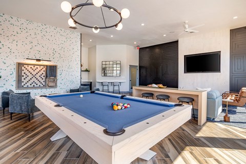a clubhouse with a pool table and a tv at Sladestone Shadow Creek, Texas, 77584