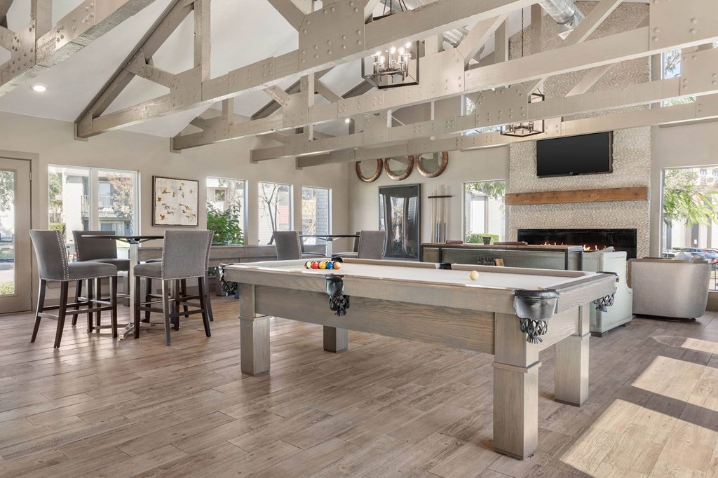 a games room with a pool table in a clubhouse at South Lamar Village, Texas, 78704