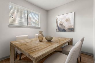 a dining room with a table and chairs at South Lamar Village, Austin, TX, 78704