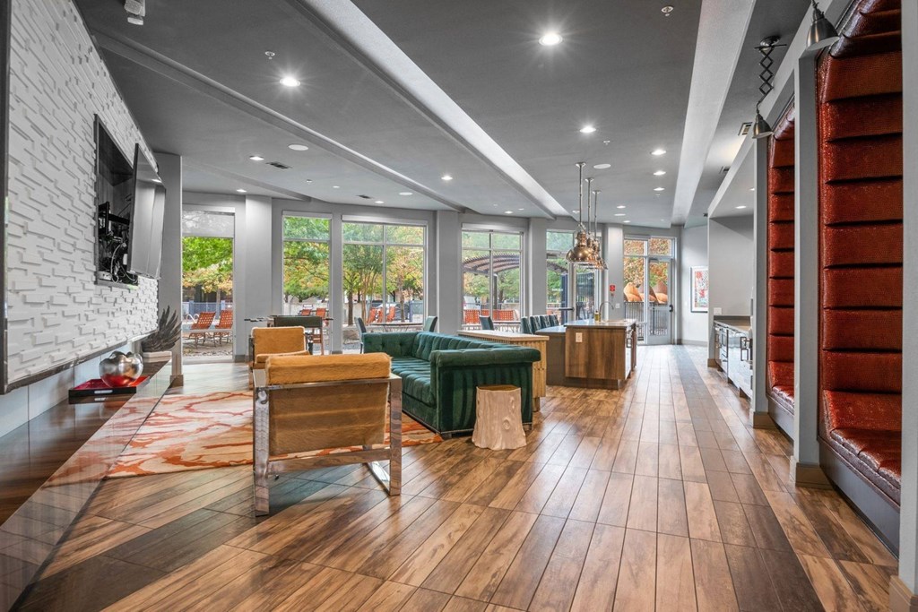 the lobby of a condo with a living room and a dining room at South Side Flats, Dallas, TX