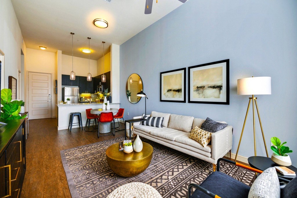 a living room with a couch and a table at South Side Flats, Texas