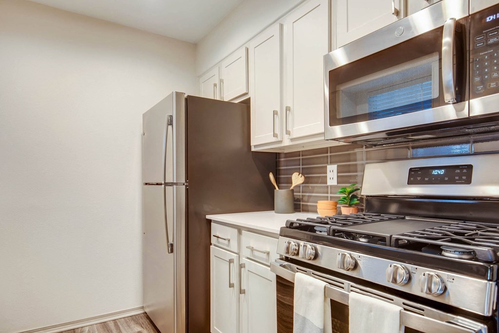 Kitchen with fridge and stove