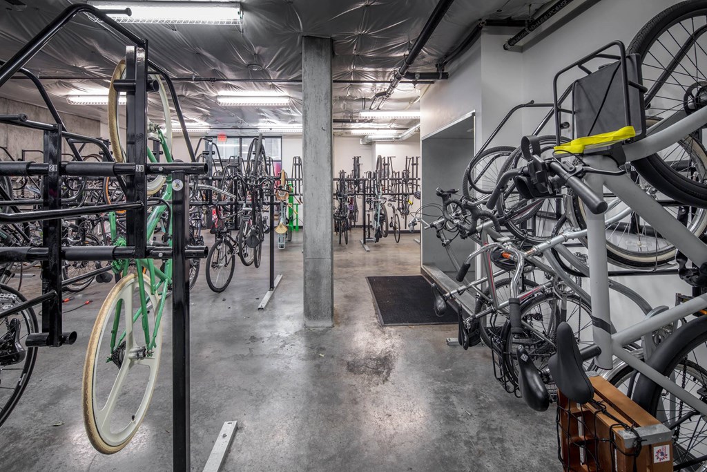 a large bike rack filled with bikes at The Parker Apartments, Portland, 97209