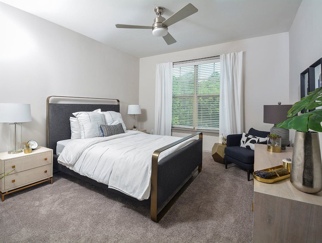 A bedroom with bed and window at the Tribute at The Tribute, Raleigh, 27612