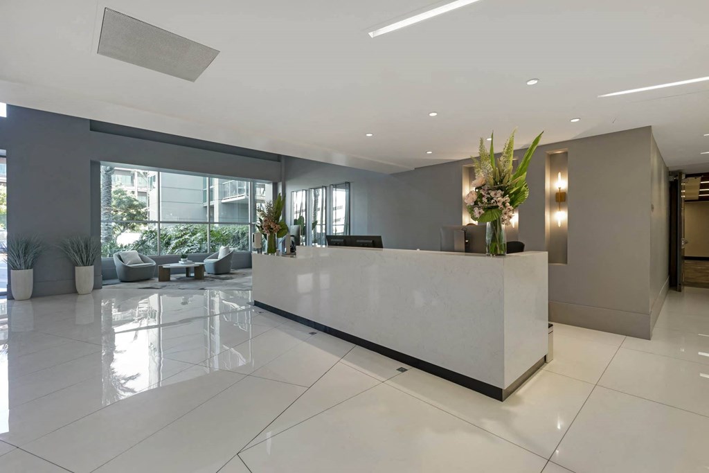 the lobby or reception area of an office building with a reception desk  at Vue, California