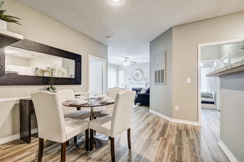 Dining area with modern furnishings and hallway at Wyndchase Aspen Grove Apartments, Franklin, TN 37067