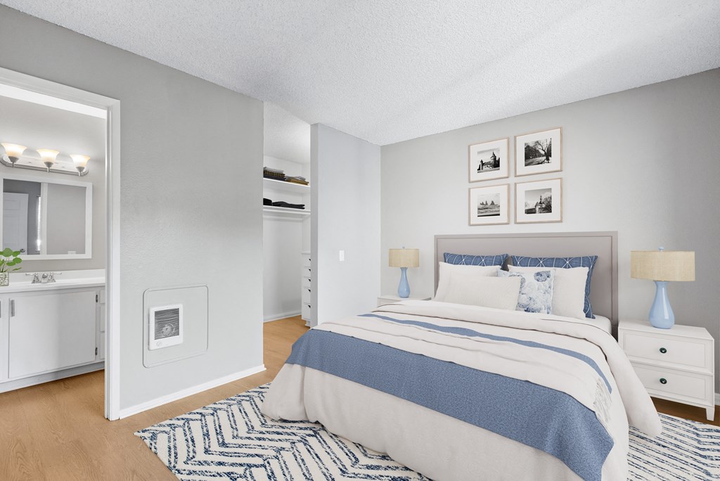 a bedroom with a bed and a closet