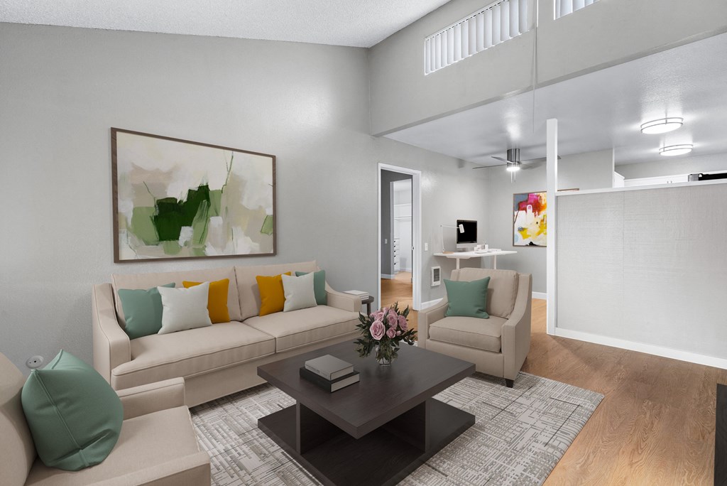 a living room with couches and a coffee table