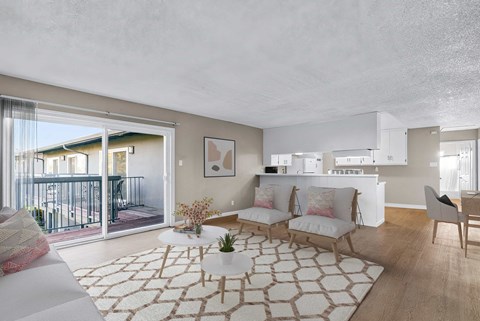 a living room with a white couch and a rug