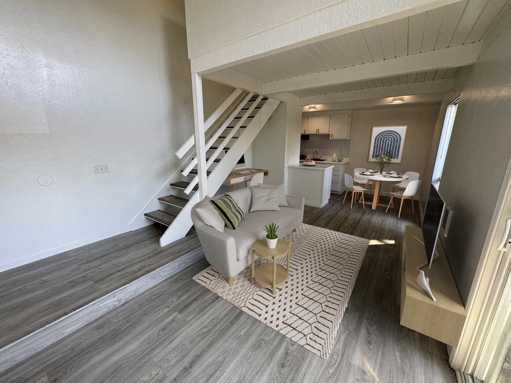 a living room with a couch and a table