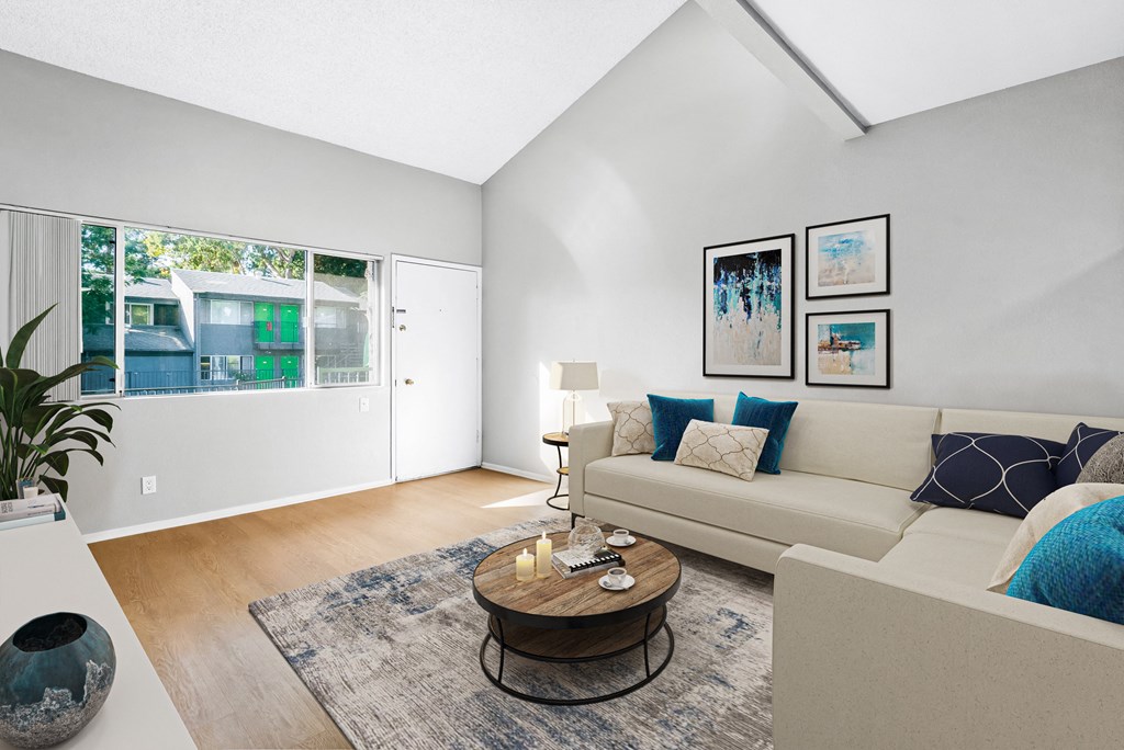 a living room with a couch and a coffee table