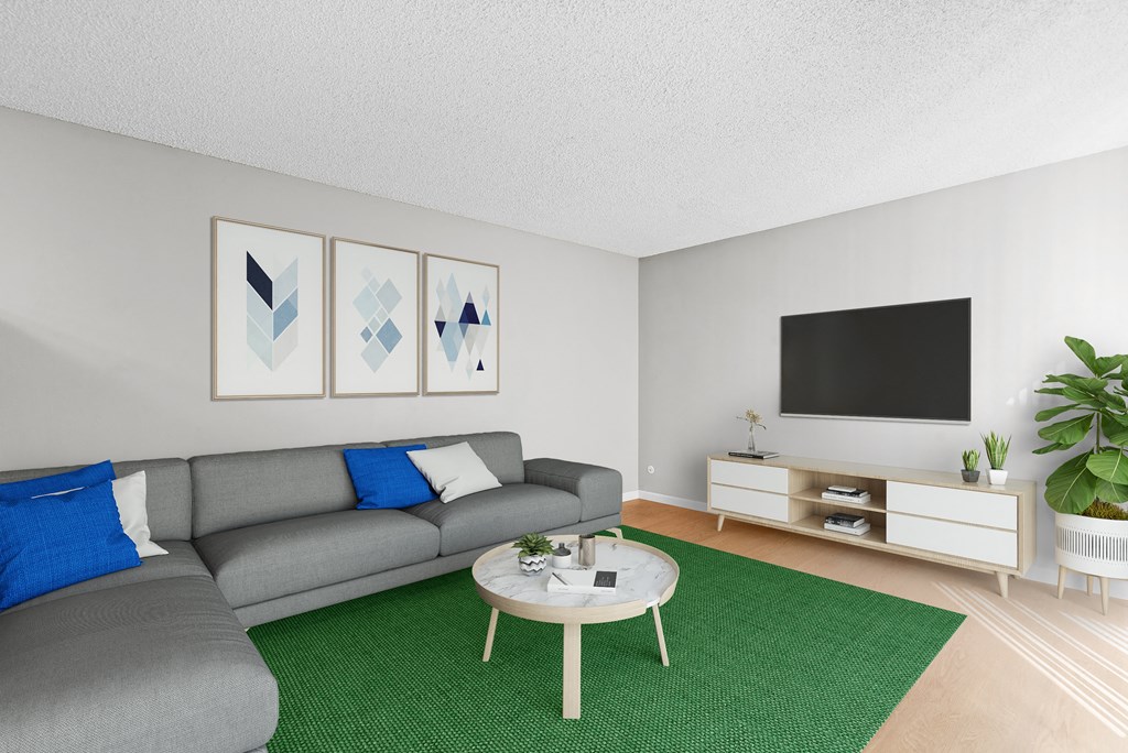 a living room with a couch and a coffee table