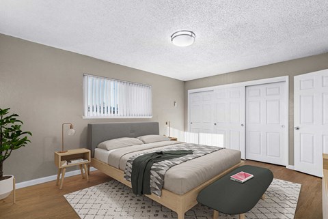 a bedroom with a bed and a rug