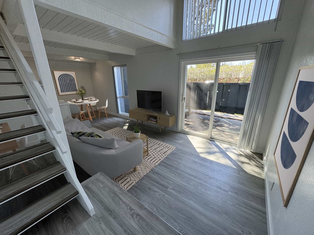 a view of the living room from the stairs