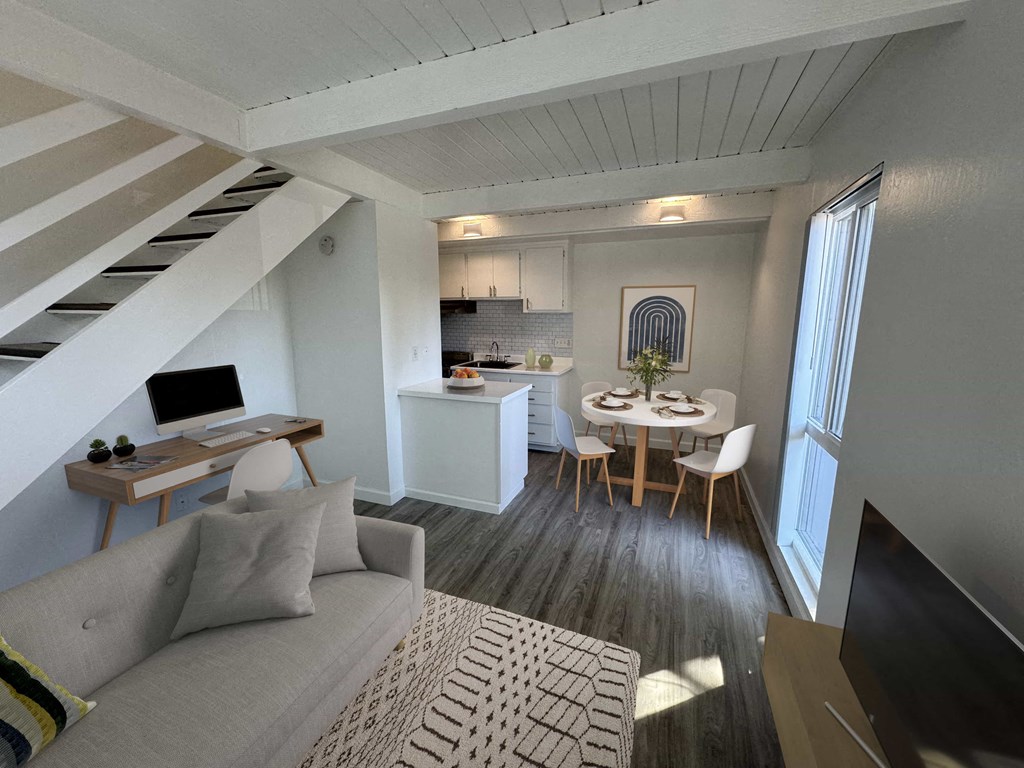 a small living room with a couch and a table