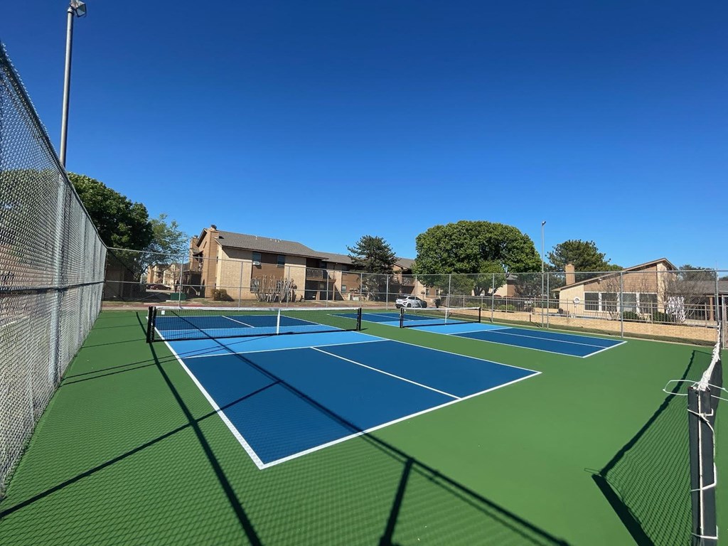 two tennis courts at the preserve at polo ridge