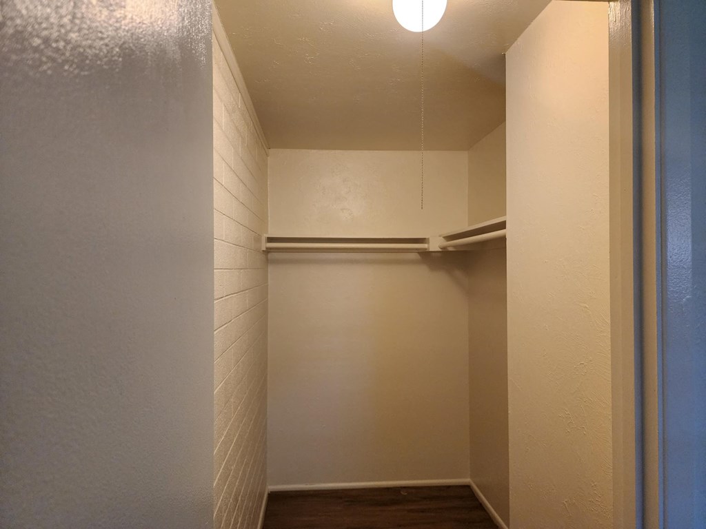 a walk in closet at the historic electric building in fort worth, tx
