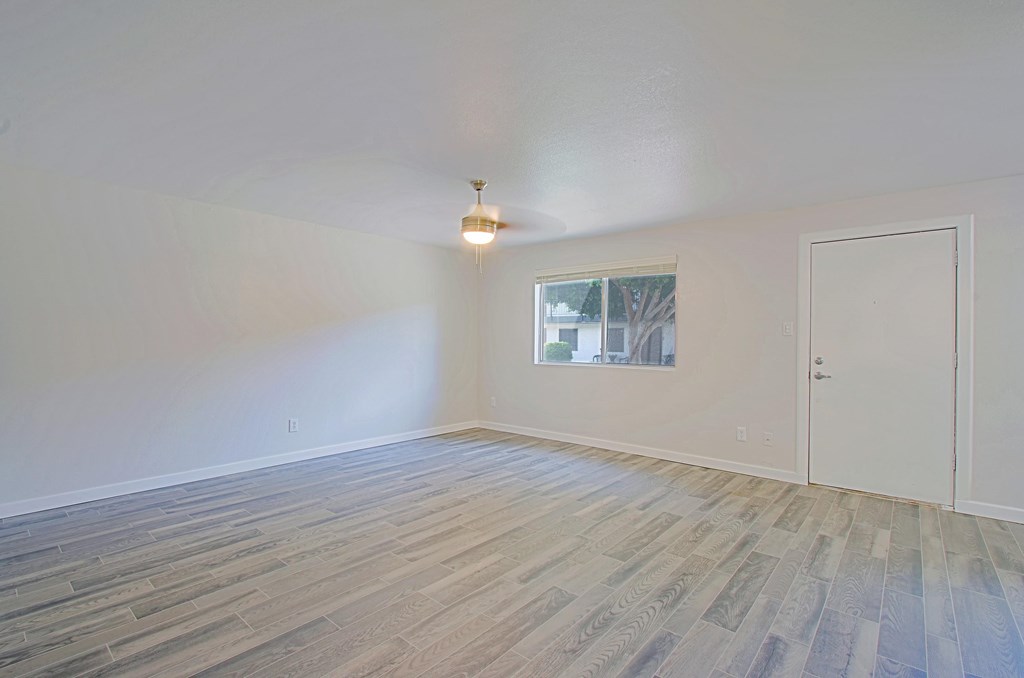 Unfurnished room with wooden floor at Aspire Mesa, Mesa, AZ,  85210.