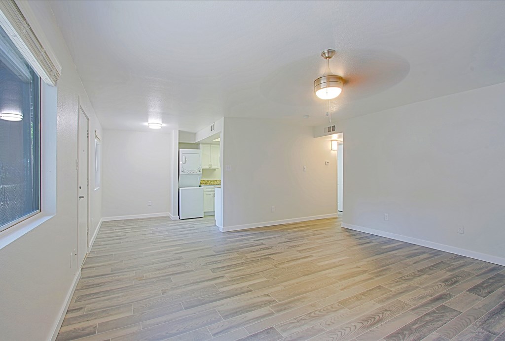 A room with a wooden floor and a ceiling light at Aspire Mesa, Mesa, AZ,  85210.