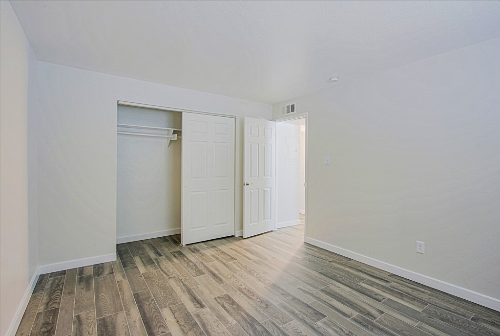 A room with a white door and a white wall at Aspire Mesa, AZ, 85210.