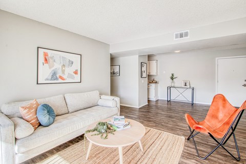 a living room with a couch and a coffee table