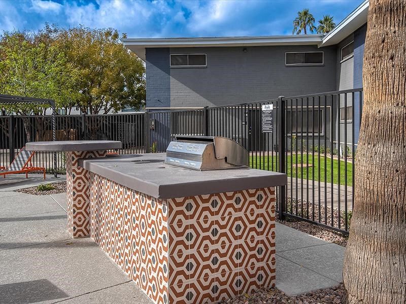 a table with a box on it in front of a building