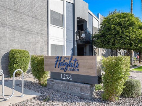 a building with a sign that reads the heights on bloom