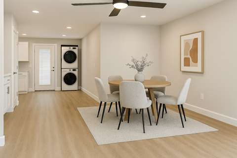 A dining room with a table set for four.