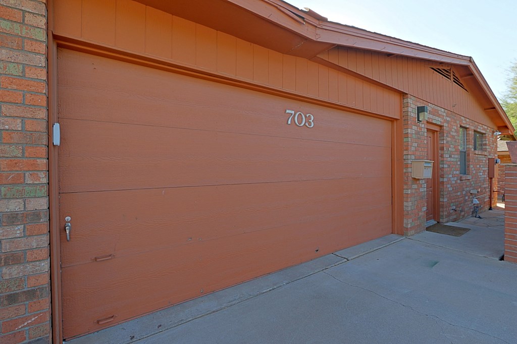 the side of a garage door with the number 708 on it