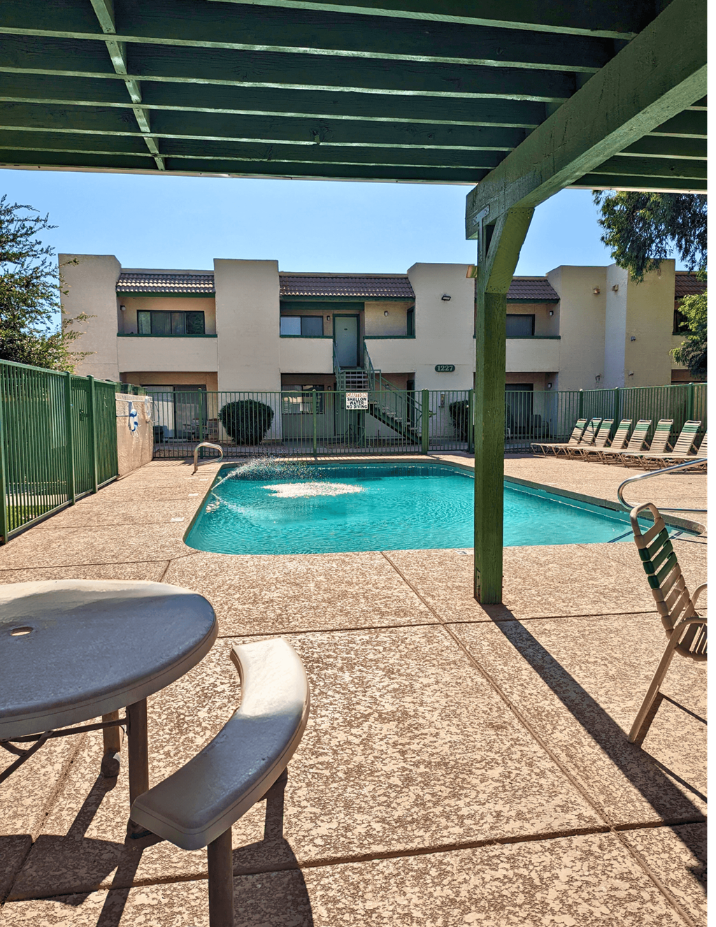 our apartments in a city have a large pool and hot tub