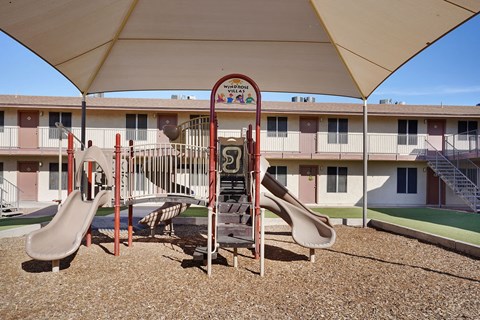 Playground with a slide at Windrose Villas Apartments, Phoenix, 85029