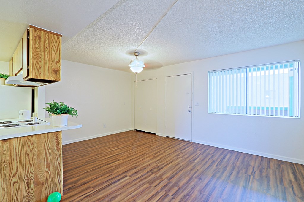 a kitchen and living room in a 555 waverly unit