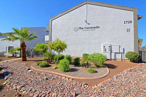 a building with a garden in front of it