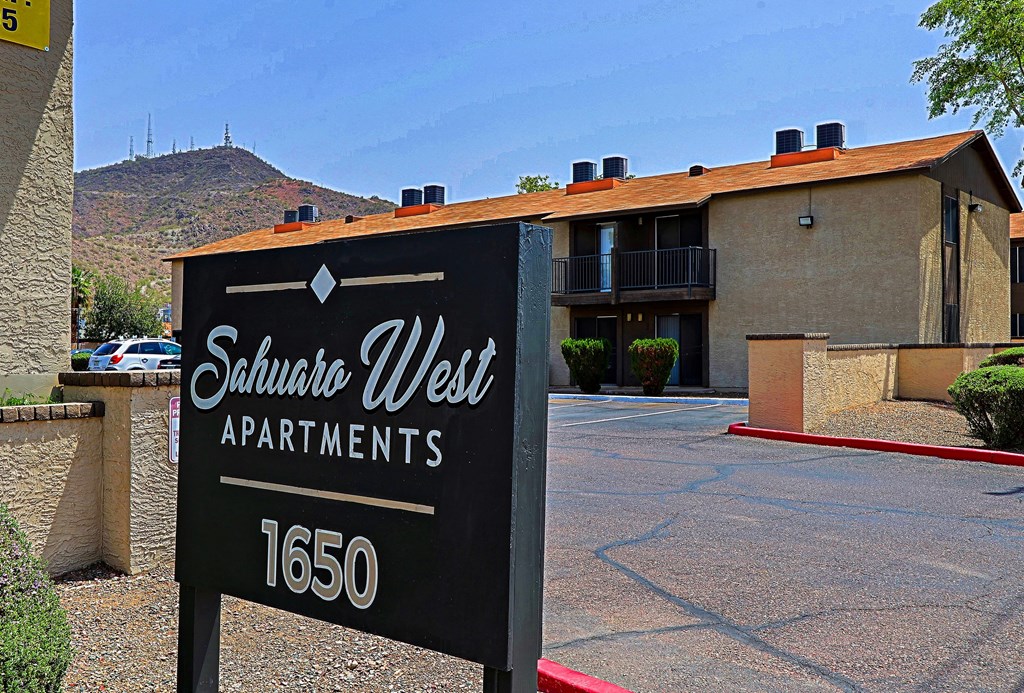 Sahara West Apartments is a large apartment complex with a sign in front.