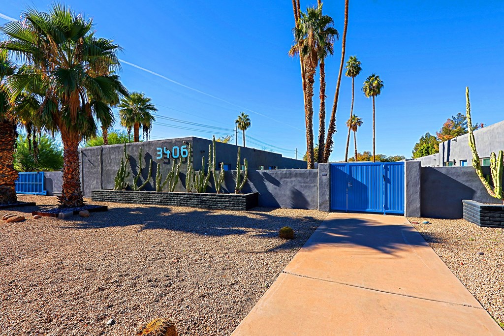 A concrete wall with the number 3506 on it.